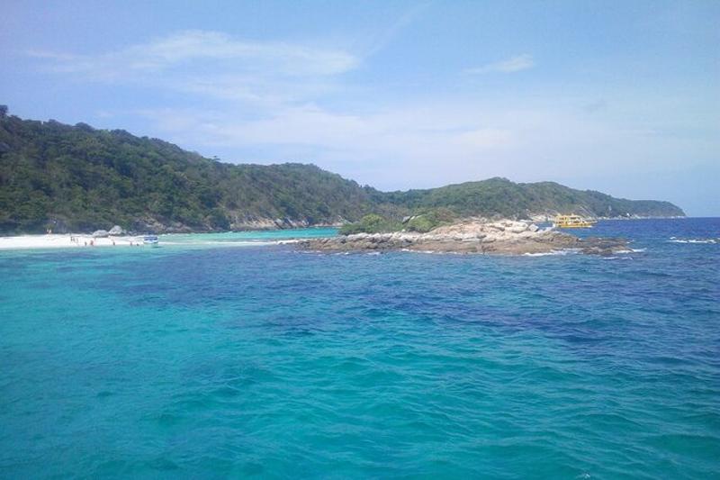 Dive into the colorful coral reefs while snorkeling at Koh Racha Yai Island.
