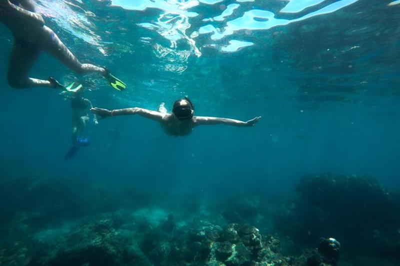 Swim with fish and explore the stunning underwater world of Koh Racha Yai Island.