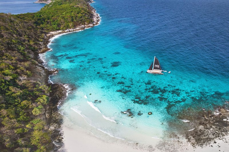 Coral Island in Thailand, with its stunning coral reefs and clear waters ideal for snorkeling and re